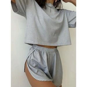 Women's grey striped knit lounge set with short sleeve top and elastic waist shorts