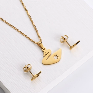 Minimalist 18k gold plated swan jewelry set featuring hollow floral necklace and earrings