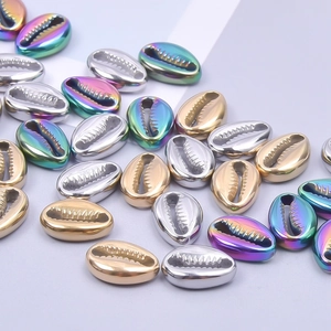 DIY shell-shaped stainless steel charms in gold, silver, and rainbow 18k plated finishes
