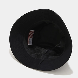 Detail of black bucket hat showing breathable mesh lining and adjustable drawstring