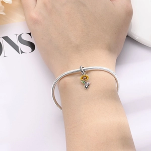 Silver snake chain bracelet with colorful sunflower and cute panda enamel charms