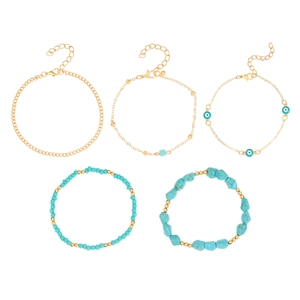 Juego de cinco tobilleras de cadenas doradas y cuentas turquesas con ojo turco azul
