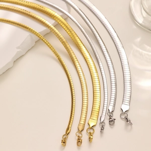 Golden and silver herringbone flat snake chains in various widths with lobster clasp