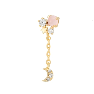 Detailed macro view of 18K gold star and moon earrings with pink stones and zircon