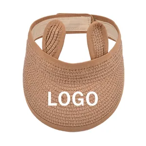 Detail of adjustable Velcro strap and sweatband on kids straw hat with rabbit ears