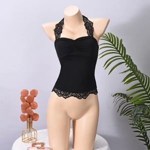 Chic black halter top featuring delicate lace trim and backless design on a mannequin