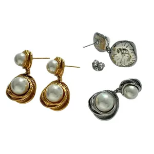 Elegant retro pearl drop earrings in gold and silver finish with spiral metal wrapping