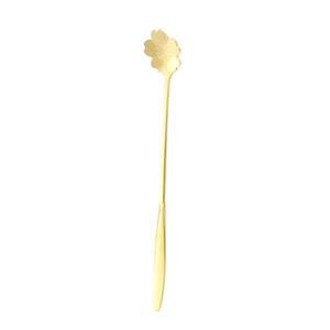 Golden stainless steel long-handle cherry blossom coffee spoon on white background