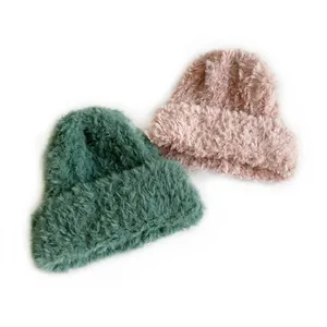 Plush faux fur knit beanie hats for women in dark green and light pink colors