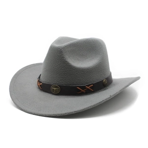 Detail of grey felt cowboy hat featuring brown band with bull head metal buckle