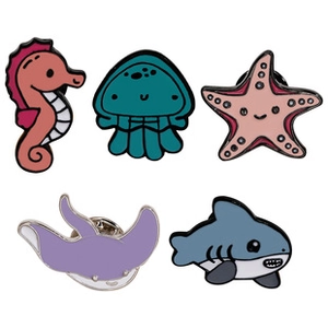 Detailed view of colorful enamel marine animal badges with metal edges and butterfly clasps