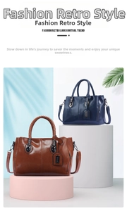 Detail of vintage Boston bags featuring woven handles and glossy oil wax leather finish