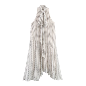Elegant polka dot halter maxi dress with self-tie neckline and irregular flowy hemline
