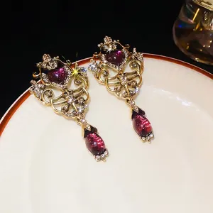 Vintage palace style long earrings with purple heart and waterdrop crystals in gold finish