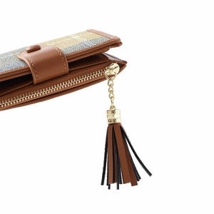 Detail of brown plaid wallet with leather trim and gold tassel zipper puller