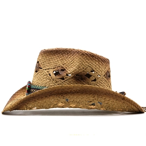 Detail of brown straw cowboy hat with hollow star patterns and ethnic beaded band