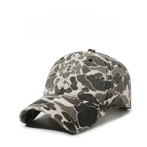 Detail view of the washed camo baseball cap with a classic six-panel design and curved brim