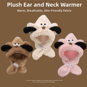 Detail view of plush faux fur hood hats with cartoon eyes and scarf neck warmers in three colors