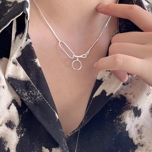 Minimalist 925 sterling silver geometric link necklace worn on model's neck