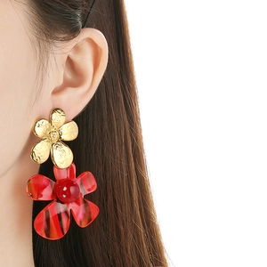 Exaggerated double flower drop earrings with red resin petals and gold stainless steel