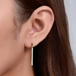 Elegant S925 sterling silver gold bar earrings with zircons on model side view