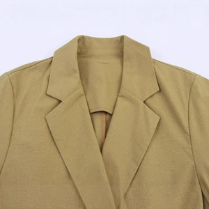 Linen blend double-breasted blazer in camel, featuring professional lapel and shoulder details