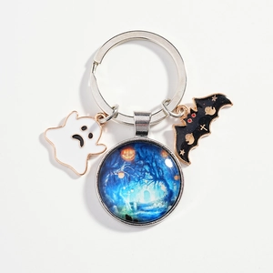 Halloween keychain with ghost, bat, and pumpkin glass pendants on a white background
