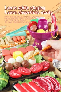 Detail of children's play kitchen toy set featuring pretend hot pot food and utensils