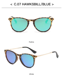 Front and 45-degree side view of oval kids' sunglasses in hawksbill frame and blue lens