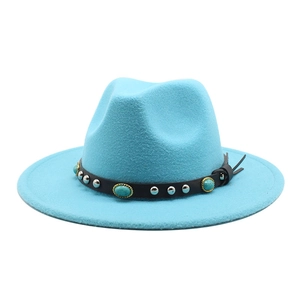 Detail of blue felt fedora with black leather belt, silver studs and turquoise stones