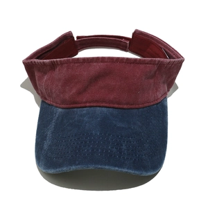 Retro washed cotton sun visor hat in burgundy and navy blue with adjustable velcro strap