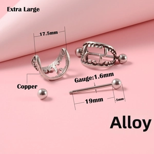 Macro view of vampire teeth nipple rings showing 1.6mm gauge and detailed silver finish