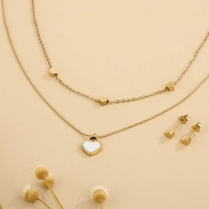 Gold double-layered titanium steel necklace set with heart pendants and mop stone accents