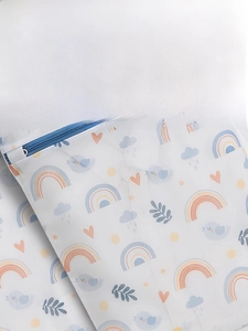 Macro shot of durable fine mesh laundry bag with blue zipper and colorful bird patterns