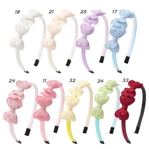 9-piece set of girls' macaron candy-colored bow headbands in soft textured fabric