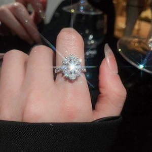 Close-up of a floral zircon ring featuring multi-layer petals and high-quality sparkle