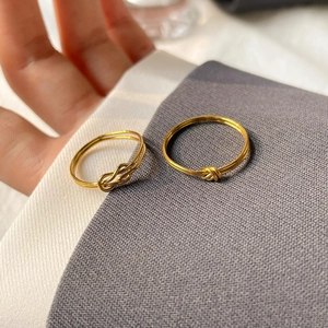Elegant gold knot rings set in minimalist style for women, layering fashion jewelry
