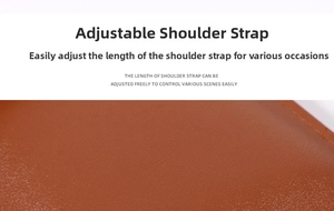 Detail of adjustable brown leather shoulder strap with fine stitching and litchi texture