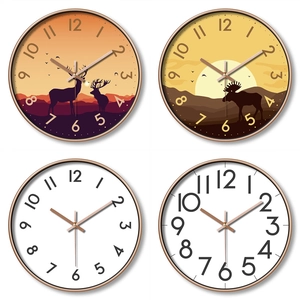 10-inch modern wall clock with rose gold metal frame and minimalist illustrated dials