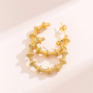 18K gold plated C-shape bamboo hoop earrings with spiral spring texture for women