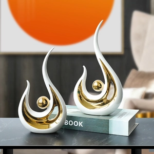 Modern abstract ceramic sculptures in white and gold for luxury living room decor