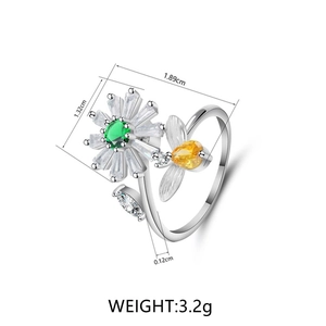 Detailed size chart for the rotating daisy and bee ring showing 3.2g weight and dimensions