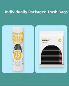 Detail of drawstring trash bags in rolls showing black privacy material and 45x50cm size