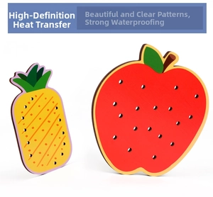 Detail showing waterproof heat transfer printing on wooden apple and pineapple lacing toys