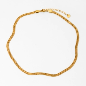 Minimalist three-layer gold beaded chain necklace with adjustable clasp on white background