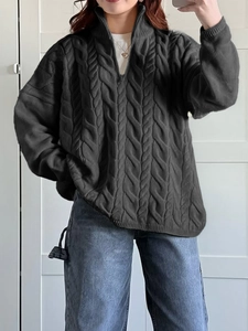 Women's dark grey cable knit sweater with half-zip stand collar and loose relaxed fit