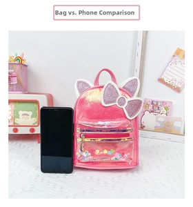 Pink sequin cat ear backpack with bow and clear heart-shaped glitter front pocket