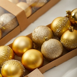 6cm gold Christmas balls with shiny and matte textures in a premium kraft paper box