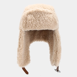 Winter faux shearling trapper hat with ear flaps and brown leather chin strap