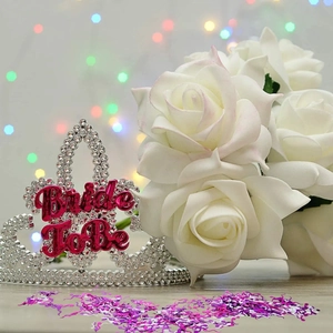 Elegant Bride To Be rhinestone tiara with white roses and colorful party confetti decorations